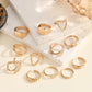 The 12-piece set of metallic-looking smooth rings is perfect for women to wear at daily parties.