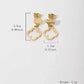 A pair of hollowed out four leaf flower earrings are exquisite, fashionable, and elegant