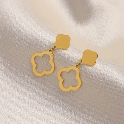 A pair of hollowed out four leaf flower earrings are exquisite, fashionable, and elegant