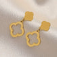 A pair of hollowed out four leaf flower earrings are exquisite, fashionable, and elegant
